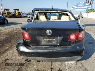 2010 Volkswagen Jetta Limited Edition with VIN 3VWAZ7AJ4AM127517, listed as a Copart auction lot 43076675 with Not provided miles and Salvage title. Bid and sale history available at DreamBid. Image 6.
