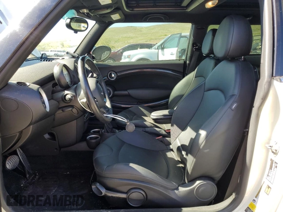 2013 MINI Hardtop S with VIN WMWSV3C52DT389468, listed as a Copart auction lot 57293845 with 84,723 mi miles and Salvage title. Bid and sale history available at DreamBid. Image 7.