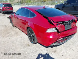 2012 Audi A7 Prestige with VIN WAU2GAFC5CN120425, listed as a IAAI auction lot 41747630 with 128,401 mi miles and . Bid and sale history available at carsss.com. Image 3.
