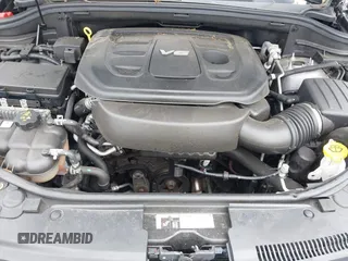 2019 Jeep Grand Cherokee Laredo E with VIN 1C4RJFAG5KC567003, listed as a IAAI auction lot 42390239 with 82,505 mi miles and . Bid and sale history available at DreamBid. Image 10.