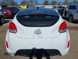 2016 Hyundai Veloster z VIN KMHTC6AD3GU267365, wystawiony jako IAAI lot #41469796 z przebiegiem 111 791 mil mil oraz . Historia ofert i sprzedaży dostępna na DreamBid. Obrazek 17.