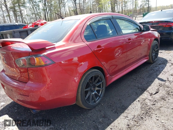 2011 Mitsubishi Lancer ES with VIN JA32U2FU3BU036133, listed as a IAAI auction lot 41970838 with 142,838 mi miles. Bid and sale history available at carsss.com. Image 4.