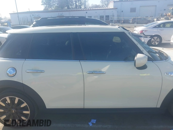 2021 MINI Hardtop 4 Door Cooper S with VIN WMWXU9C00M2P04693, listed as a IAAI auction lot 41785185 with 57,848 mi miles and . Bid and sale history available at DreamBid. Image 13.