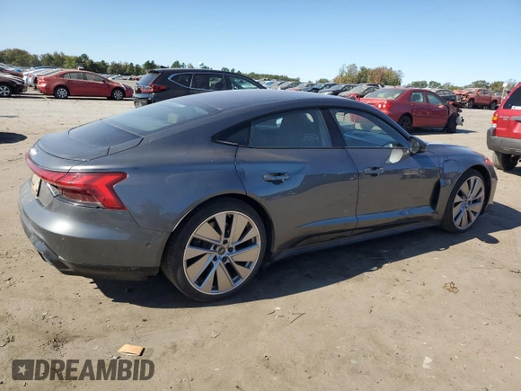 2022 Audi e-tron GT Prestige z VIN WAUEJBFW7N7006626, wystawiony jako Copart lot #75207374 z przebiegiem 27 095 mil mil oraz Szkody całkowita. Historia ofert i sprzedaży dostępna na DreamBid. Obrazek 3.