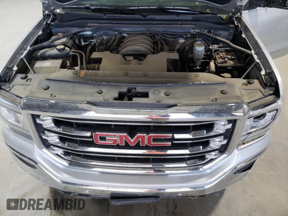 2017 GMC Sierra 1500 SLT z VIN 3GTU2NEJ4HG331858, wystawiony jako Copart lot #53089185 z przebiegiem 33 242 mil mil oraz Szkoda całkowita • Salvage title. Historia ofert i sprzedaży dostępna na DreamBid. Obrazek 13.