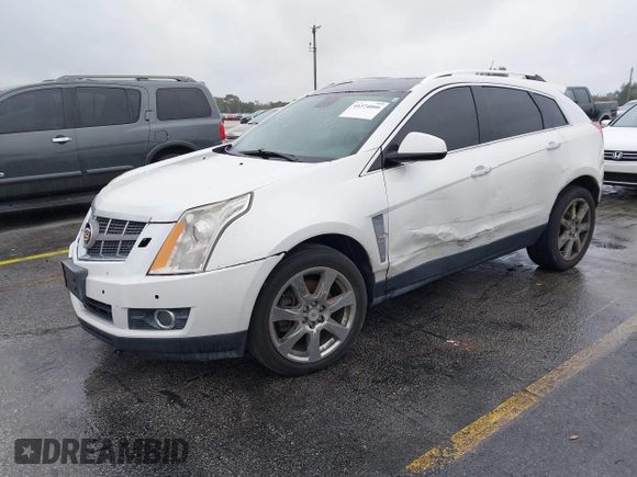 2012 Cadillac SRX Performance Collection with VIN 3GYFNEE33CS528697, listed as a IAAI auction lot 41374060 with 157,319 mi miles and . Bid and sale history available at DreamBid. Image 2.