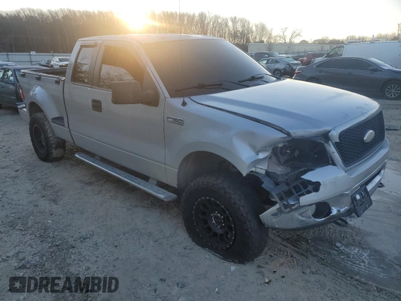 2006 Ford F-150 XLT with VIN 1FTPX04596KB93701, listed as a Copart auction lot 87672425 with 102,128 mi miles and Salvage title. Bid and sale history available at DreamBid. Image 4.