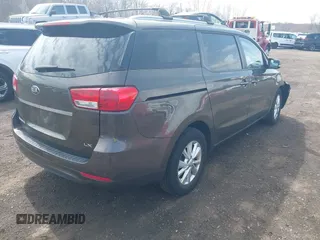 2016 Kia Sedona LX with VIN KNDMB5C11G6158934, listed as a IAAI auction lot 41908323 with 105,888 mi miles and . Bid and sale history available at carsss.com. Image 4.
