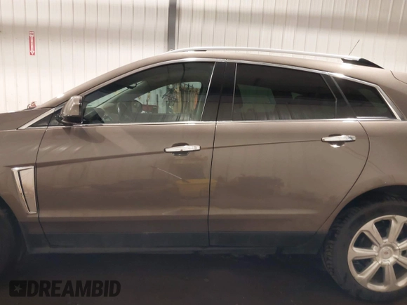 2014 Cadillac SRX Performance Collection z VIN 3GYFNFE38ES578066, wystawiony jako IAAI lot #42153023 z przebiegiem 134 009 mil mil oraz . Historia ofert i sprzedaży dostępna na DreamBid. Obrazek 15.