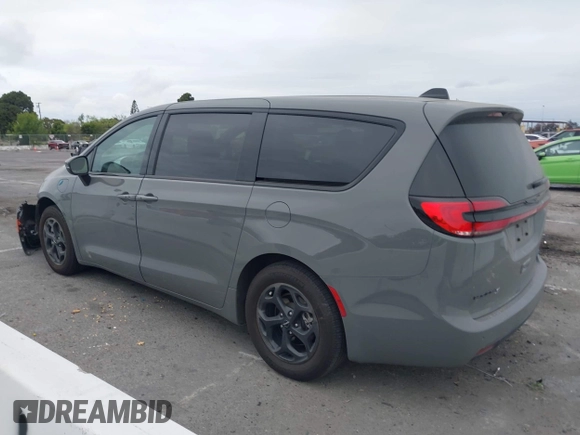 2023 Chrysler Pacifica Hybrid Touring L with VIN 2C4RC1L71PR584485, listed as a IAAI auction lot 42056423 with 58,955 mi miles and . Bid and sale history available at DreamBid. Image 15.