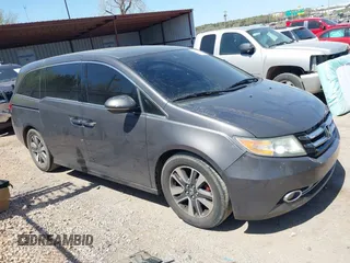 2015 Honda Odyssey Touring Elite with VIN 5FNRL5H98FB034700, listed as a IAAI auction lot 42019265 with 226,829 mi miles and . Bid and sale history available at DreamBid. Image 13.