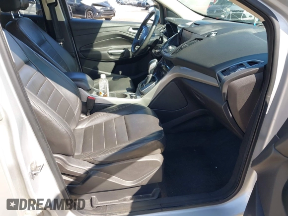 2013 Ford Escape SEL with VIN 1FMCU9H94DUA25017, listed as a IAAI auction lot 41976238 with 171,885 mi miles and . Bid and sale history available at DreamBid. Image 5.