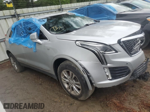 2020 Cadillac XT5 Premium Luxury FWD with VIN 1GYKNCRS4LZ123097, listed as a Copart auction lot 44147615 with 168,963 mi miles and Clean title. Bid and sale history available at DreamBid. Image 4.