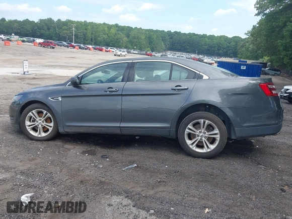 2017 Ford Taurus SEL with VIN 1FAHP2E82HG132551, listed as a IAAI auction lot 42633317 with 80,785 mi miles and . Bid and sale history available at DreamBid. Image 14.