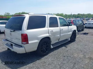 2003 Cadillac Escalade z VIN 1GYEK63N43R222254, wystawiony jako IAAI lot #42228127 z przebiegiem 167 294 mil mil oraz . Historia ofert i sprzedaży dostępna na DreamBid. Obrazek 4.