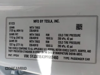 2023 Tesla Model 3 with VIN 5YJ3E1EA3PF617460, listed as a IAAI auction lot 42154401 with 9,578 mi miles and . Bid and sale history available at DreamBid. Image 9.