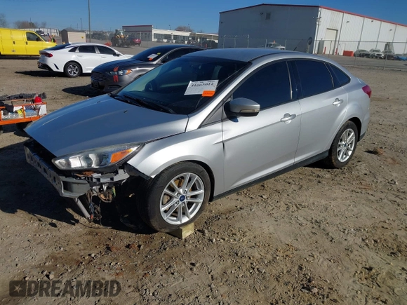 2016 Ford Focus SE with VIN 1FADP3F27GL390830, listed as a IAAI auction lot 41665012 with 119,673 mi miles. Bid and sale history available at carsss.com. Image 2.