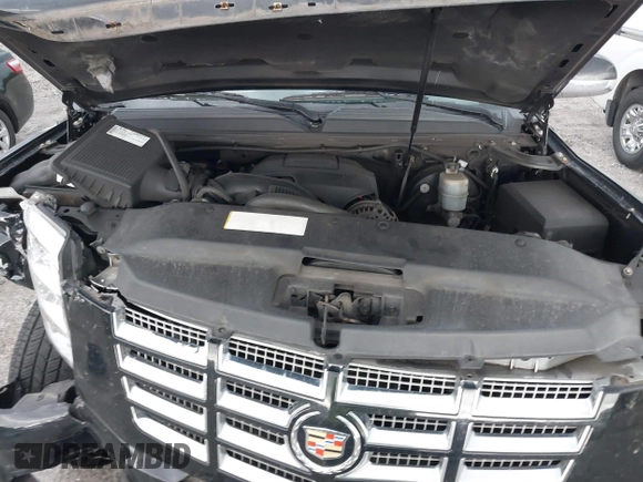 2009 Cadillac Escalade z VIN 1GYFC23249R116363, wystawiony jako IAAI lot #39887498 z przebiegiem 140 095 mil mil oraz . Historia ofert i sprzedaży dostępna na DreamBid. Obrazek 10.