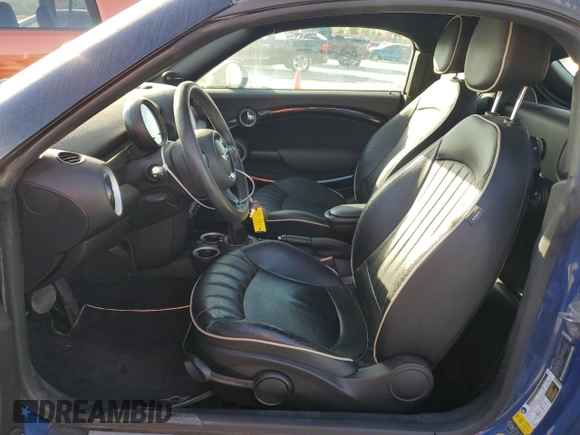 2012 MINI Cooper Coupe with VIN WMWSX1C5XCT163773, listed as a Copart auction lot 85792764 with 70,411 mi miles and Salvage Title. Bid and sale history available at carsss.com. Image 7.