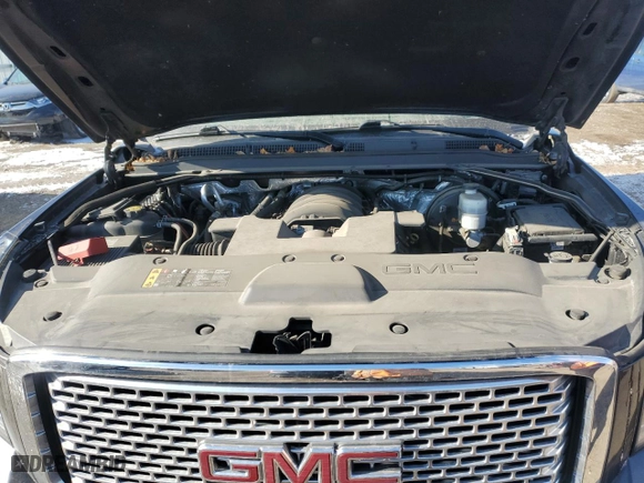 2017 GMC Yukon Denali with VIN 1GKS2CKJ0HR215836, listed as a Copart auction lot 86293304 with 77,535 mi miles and Salvage Title. Bid and sale history available at carsss.com. Image 13.