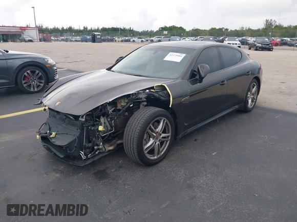 2015 Porsche Panamera 4 с VIN WP0AA2A71FL002436, выставлен на аукционе IAAI как лот 42479904 с пробегом 64 750 миль миль и . История ставок и продаж доступна на DreamBid. Изображение 18.