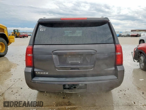 2015 Chevrolet Tahoe LS z VIN 1GNSCAKC4FR113247, wystawiony jako Copart lot #55578085 z przebiegiem 194 023 mil mil oraz Szkoda całkowita • Salvage title. Historia ofert i sprzedaży dostępna na DreamBid. Obrazek 6.