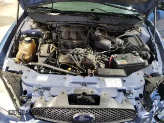2004 Ford Taurus SE z VIN 1FAFP532X4A187754, wystawiony jako Copart lot #51262185 z przebiegiem 121 663 mil mil oraz Szkoda całkowita • Salvage title. Historia ofert i sprzedaży dostępna na DreamBid. Obrazek 11.