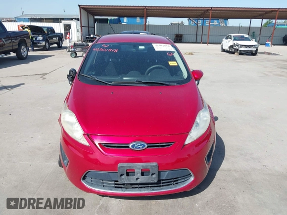 2012 Ford Fiesta SE z VIN 3FADP4EJ9CM140948, wystawiony jako IAAI lot #42301818 z przebiegiem 109 276 mil mil oraz . Historia ofert i sprzedaży dostępna na DreamBid. Obrazek 13.