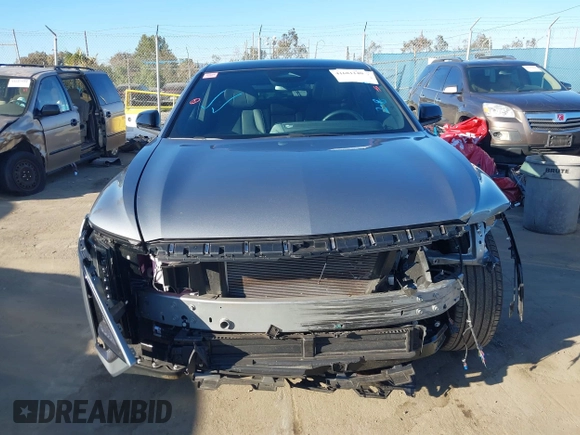 2024 Cadillac LYRIQ Sport z VIN 1GYKPTRL7RZ110193, wystawiony jako IAAI lot #41681140 z przebiegiem 14 218 mil mil oraz . Historia ofert i sprzedaży dostępna na DreamBid. Obrazek 12.