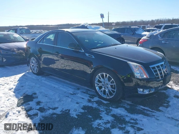 2013 Cadillac CTS Premium z VIN 1G6DS5E34D0160676, wystawiony jako IAAI lot #41262795 z przebiegiem 122 248 mil mil oraz . Historia ofert i sprzedaży dostępna na DreamBid. Obrazek 1.