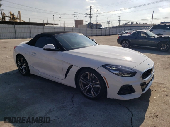 2023 BMW Z4 sDrive30i with VIN WBAHF3C06PWY01020, listed as a Copart auction lot 43236464 with 6,860 mi miles. Bid and sale history available at carsss.com. Image 4.