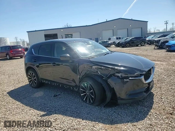 2018 Mazda CX-5 Grand Touring with VIN JM3KFBDM0J0434704, listed as a Copart auction lot 53732715 with Not Provided miles and Salvage Title. Bid and sale history available at DreamBid. Image 12.