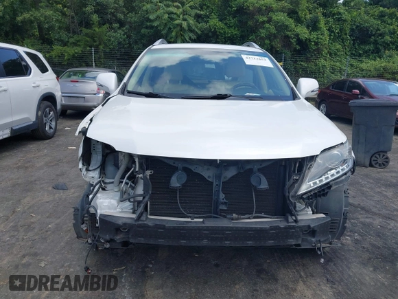 2013 Lexus RX 350 z VIN JTJBK1BA8D2458889, wystawiony jako IAAI lot #42713652 z przebiegiem 124 751 mil mil oraz . Historia ofert i sprzedaży dostępna na DreamBid. Obrazek 13.