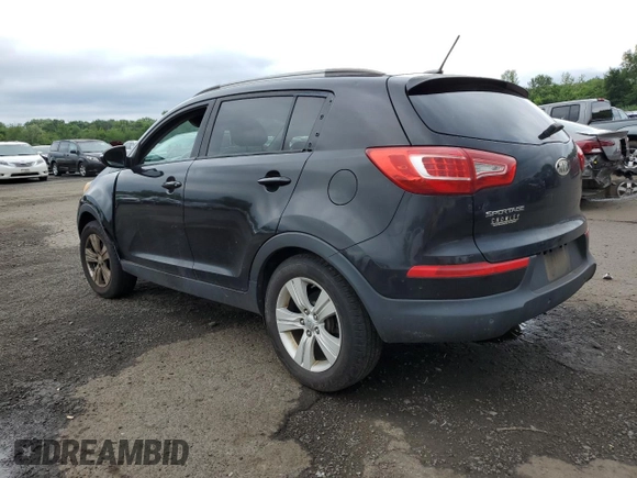 2011 Kia Sportage LX with VIN KNDPBCA24B7012852, listed as a Copart auction lot 63837085 with 186,805 mi miles and Salvage title. Bid and sale history available at DreamBid. Image 2.