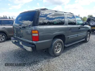 2002 Chevrolet Suburban LS z VIN 3GNEC16Z62G255198, wystawiony jako IAAI lot #42312829 z przebiegiem 192 459 mil mil oraz . Historia ofert i sprzedaży dostępna na DreamBid. Obrazek 4.