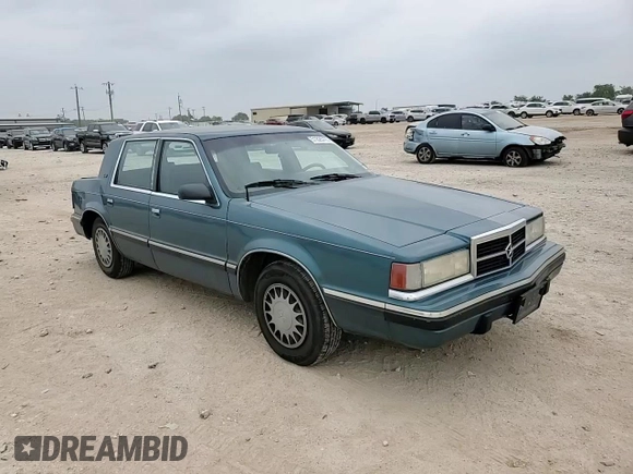1993 Dodge Dynasty LE z VIN 1B3XC56R3PD124521, wystawiony jako Copart lot #51825725 z przebiegiem 94 336 mil mil oraz Szkoda całkowita • Salvage title. Historia ofert i sprzedaży dostępna na DreamBid. Obrazek 11.