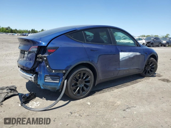 2022 Tesla Model Y Long Range z VIN 7SAYGDEEXNF444122, wystawiony jako Copart lot #54344735 z przebiegiem 33 230 mil mil oraz Szkody całkowita. Historia ofert i sprzedaży dostępna na DreamBid. Obrazek 3.