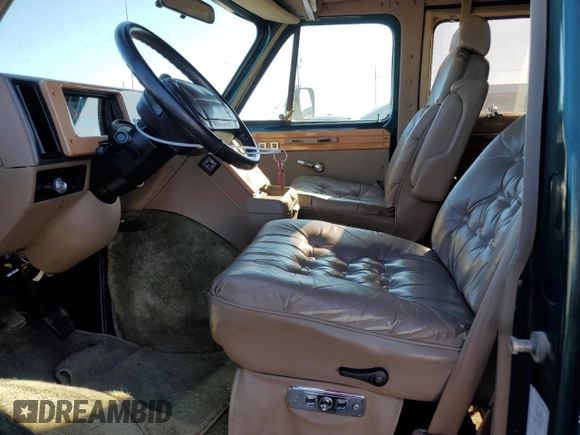 1995 Chevrolet Chevy Van z VIN 1GBEG25K3SF249372, wystawiony jako Copart lot #72284224 z przebiegiem 72 331 mil mil oraz Tytuł czysty. Historia ofert i sprzedaży dostępna na DreamBid. Obrazek 7.