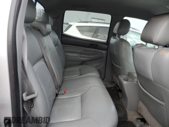2007 Toyota Tacoma z VIN 5TEMU52NX7Z371642, wystawiony jako Copart lot #45928575 z przebiegiem 221 028 mil mil oraz Szkoda całkowita • Salvage title. Historia ofert i sprzedaży dostępna na DreamBid. Obrazek 10.