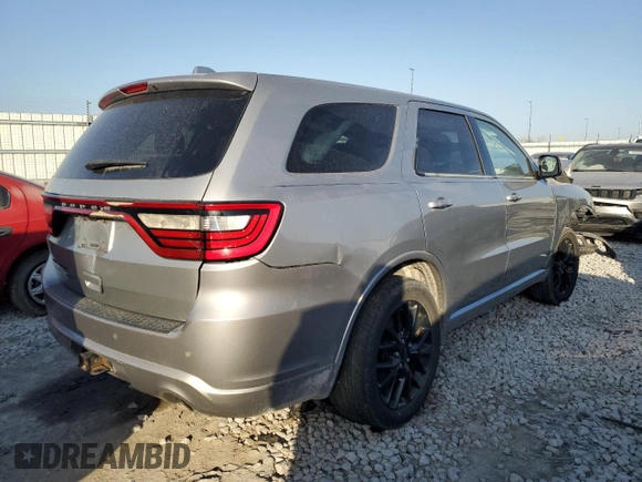 2015 Dodge Durango SXT with VIN 1C4RDJAG8FC810450, listed as a Copart auction lot 48886965 with 184,992 mi miles and Salvage Title. Bid and sale history available at carsss.com. Image 3.