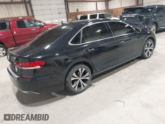 2021 Volkswagen Passat SE z VIN 1VWSA7A39MC001401, wystawiony jako IAAI lot #42019308 z przebiegiem 82 203 mil mil oraz . Historia ofert i sprzedaży dostępna na DreamBid. Obrazek 4.