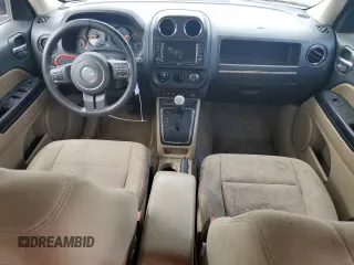 2014 Jeep Patriot Latitude with VIN 1C4NJRFB8ED845677, listed as a Copart auction lot 66019864 with 188,587 mi miles and Salvage Title. Bid and sale history available at carsss.com. Image 8.