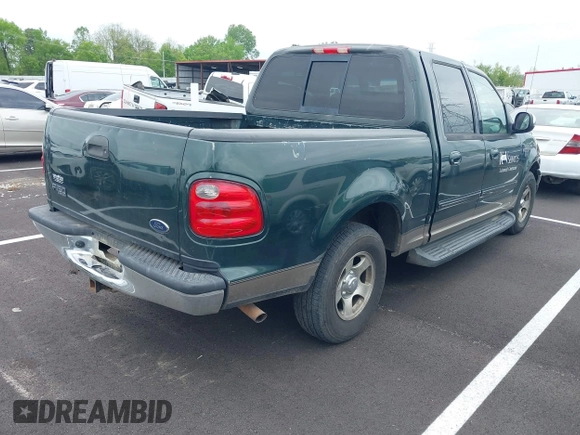2002 Ford F-150 XLT with VIN 1FTRW07L82KB04538, listed as a IAAI auction lot 42104767 with Not Provided miles and . Bid and sale history available at DreamBid. Image 4.