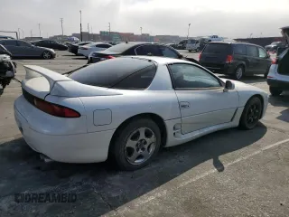1999 Mitsubishi 3000GT z VIN JA3AM44H2XY002634, wystawiony jako Copart lot #73501144 z przebiegiem 70 229 mil mil oraz Tytuł czysty. Historia ofert i sprzedaży dostępna na DreamBid. Obrazek 3.