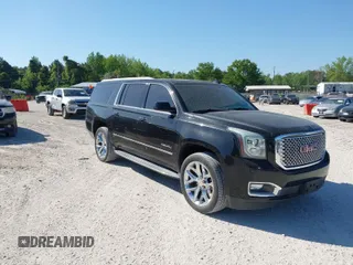 2015 GMC Yukon XL Denali with VIN 1GKS2JKJ3FR529255, listed as a IAAI auction lot 42059722 with 171,005 mi miles. Bid and sale history available at carsss.com. Image 1.
