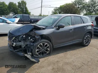 2016 Mazda CX-5 Grand Touring z VIN JM3KE2DY9G0771208, wystawiony jako Copart lot #58903635 z przebiegiem 109 710 mil mil oraz Szkoda całkowita • Salvage title. Historia ofert i sprzedaży dostępna na DreamBid. Obrazek 1.