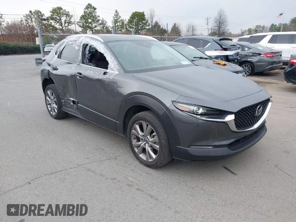 2022 Mazda CX-30 S Premium with VIN 3MVDMBDL9NM434619, listed as a IAAI auction lot 41620655 with 46,557 mi miles and . Bid and sale history available at carsss.com. Image 1.