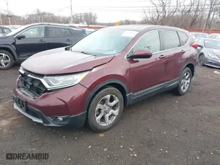 2019 Honda CR-V EX-L with VIN 7FARW2H89KE060458, listed as a IAAI auction lot 41668609 with 33,534 mi miles. Bid and sale history available at carsss.com. Image 2.