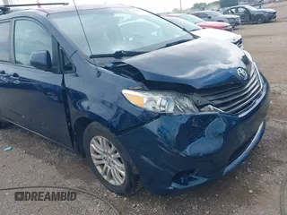 2011 Toyota Sienna XLE AAS with VIN 5TDYK3DC6BS045303, listed as a IAAI auction lot 42515203 with 205,904 mi miles and . Bid and sale history available at DreamBid. Image 6.