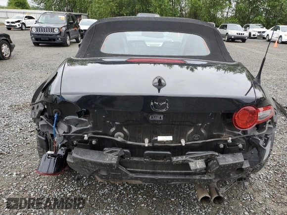 2021 Mazda MX-5 Miata Grand Touring with VIN JM1NDAD78M0455899, listed as a Copart auction lot 57347125 with 38,405 mi miles and Salvage title. Bid and sale history available at DreamBid. Image 6.